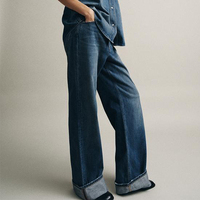 Jean décontracté en denim pour femme, style boyfriend taille mi-haute, coupe ample et jambe large, bleu uni, collection 2026, streetwear vintage, ODM/OEM