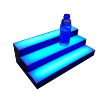 RINA Tech Custom LED Display PMMA Display da banco per cosmetici profumo di olio essenziale LED acrilico espositore di luce per negozio