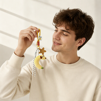 Pendentif en peluche chiot banane coloré avec pièce en cuir étoile, accessoire fantaisie pour sac à dos, clip de fixation pour sac à dos