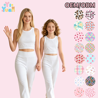 Ensemble 2 pièces d'été pour femmes élégantes : Crop top blanc sans manches et leggings courts taille haute pour un style décontracté et simple au quotidien