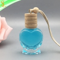 Bouteille diffuseur de parfum d'huiles essentielles pour voiture, vide, en verre transparent en forme de cœur, 12 ml, à suspendre, avec bouchon à vis et corde, design givré
