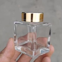 Frasco de almacenamiento de vidrio cuadrado al por mayor de fábrica con tapa de Metal 50ml 180ml 280ml 360ml 750ml botella vacía para gelatina de mermelada de miel
