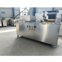 Machine tout-en-un pour la fabrication de boules de pâte pour les collations à base de flocons d'avoine, de céréales et de pâte de dattes