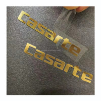 Autocollants de logo en métal transparent étiquettes de transfert UV emblèmes électroformés personnalisés décalcomanies de marque transparentes à coupe creuse pour produits