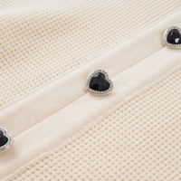 Pull en tricot personnalisé pour femme à faible MOQ, col Peter Pan, avec perles et détails ajourés, boutons décoratifs