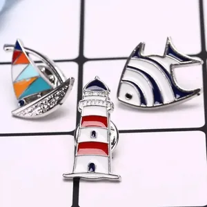 Pin pemasok Enamel keras ikan & perahu layar laut Pin mercusuar ikan air Pin logam tepi hitam bros untuk hadiah