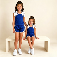 Tenue de cheerleaders pour filles, ensemble deux pièces respirant en fibre de bambou naturelle, haut sans manches personnalisable avec bretelles à nœuds et bordure contrastante