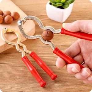 <b>Nutcracker</b> Heavy Duty Red Handle Walnut Cracker Kitchen Utensil - Product Image 1