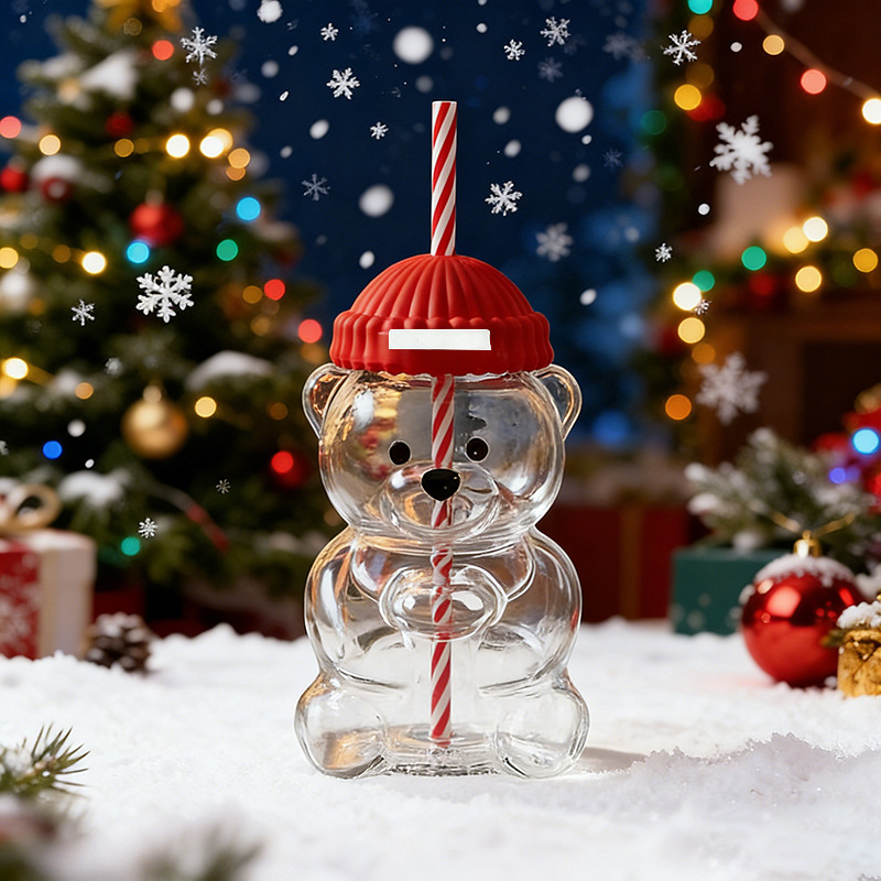 Tasse en paille de verre avec bonnet rouge de Noël
