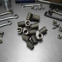 Inserts filetés autotaraudeurs en alliage de titane personnalisables XYY, types de filetage ISO métrique/pouces pour la précision automobile