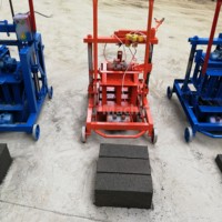 Petit sol vibrant diesel manuel Machine de fabrication de briques creuses en ciment pour la pose de blocs Prix