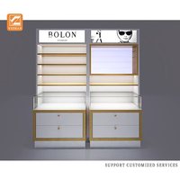 Options de taille de vitrine de lunettes optiques en métal MDF acrylique de conception personnalisée de luxe pour les lunettes de soleil, les magasins de bijoux et les centres commerciaux