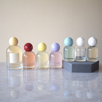 Flacon de parfum rond en verre de luxe 30ml 50ml 100ml avec bouchon à vis, sérigraphie, logo personnalisé, pulvérisateur à pompe et boîte – Prix usine
