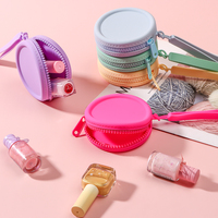 Porte-monnaie mini portable tendance en silicone avec fermeture éclair, pochette de rangement étanche, sac à main avec dragonne