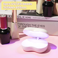 Lampe à ongles LED UV portable mini USB rechargeable de haute qualité avec fonction de séchage rapide automatique pour la manucure à domicile et le séchage du gel