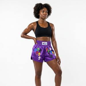 Pantalones Cortos de Boxeo Personalizados Color Morado con Apliques Cruzados Coloridos, Unisex, para Muay Thai y MMA, Corte Holgado, Elásticos, 100% Poliéster Satinado - Product Image 1
