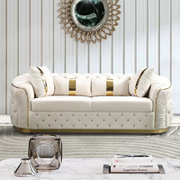 Ensemble de canapés en tissu blanc élégant et luxueux de style européen moderne avec décorations en métal doré pour la maison, le salon, l'hôtel, la villa, le bureau