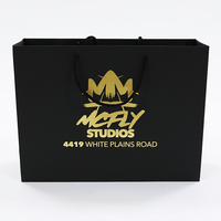 Sac en papier de luxe personnalisé avec logo, noir mat, en carton, avec poignées en corde de coton enduite d'or, vente en gros