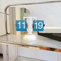 Kreative Automatische Seitenblätternde Uhr Retro Wohnzimmer-Deko Moderne Minimalistische Tischuhr Einbeinige Kleine Waage