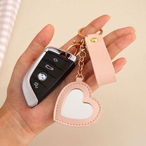 Porte-clés en cuir PU léger en forme de fleur et de cœur, mini miroir de luxe, pendentif cadeau, porte-badge, logo personnalisé - Product Image 4