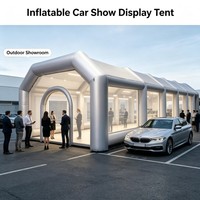 Grande tente publicitaire gonflable avec fenêtres latérales transparentes, structure épaisse pour événements extérieurs, expositions, promotion de marque