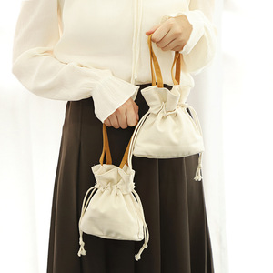 กระเป๋าผ้าแคนวาสลายเรียบง่าย สไตล์แฟชั่นสดใส พร้อมเชือกผูก สำหรับใส่โทรศัพท์มือถือ เหรียญ และของช้อปปิ้ง - Product Image 4