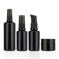 Offre Spéciale de luxe noir 50ml visage crème pour les yeux beurre corporel rond emballage cosmétique pot en verre avec couvercle noir et joint