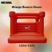 Château gonflable orange vif en PVC commercial durable, idéal pour toutes sortes de fêtes et d'événements