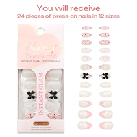 Faux ongles à presser faits main en ABS, forme amande, longueur moyenne, design 3D de luxe avec strass, style Ins, pour soirées et événements.