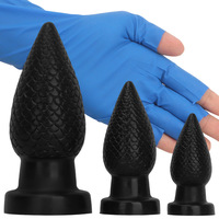 Plug anal en silicone noir surdimensionné avec ventouse, pointe pointue, design épais de la taille d'un poing pour l'entrée postérieure, jouet sexuel