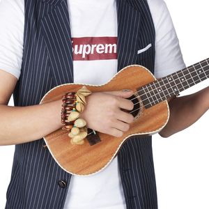 Cloche à main en coquille de noix fabriquée à la main en Indonésie, pour spectacle de danse, instrument de musique professionnel pour adultes - Product Image 3