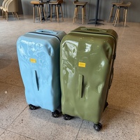 Valise rigide de luxe unisexe classique en PC, design concave-convexe, roues multidirectionnelles universelles, grande capacité, silencieuse, exportée du Royaume-Uni