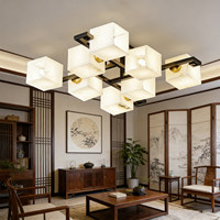 Lampe suspendue LED personnalisée en laiton et pierre, blanc chaud (3500K), design rond à intensité variable pour l'éclairage du salon