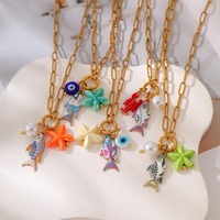Collier à fermoir en émail style bohème unique et mignon avec poisson, étoile de mer, œil et fausse perle pour femme
