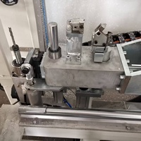Machine automatique de nettoyage des coins CNC en PVC pour la fabrication de fenêtres et de portes en PVC