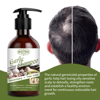 Shampooing à l'extrait d'ail Formule épaississante pour le renforcement des cheveux Anti-chute Nettoyant naturel à base de plantes Traitement du cuir chevelu