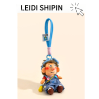 Pendentif de sac en peluche garçon aux cheveux bouclés et tachetés, mignon et original, adorable jouet de dessin animé, porte-clés, cadeau pour meilleur ami