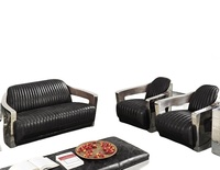 Canapé de style aviateur rétro haut de gamme avec structure en acier inoxydable brillant et cuir vintage pour salon et chambre à coucher