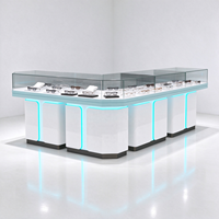 Vitrine de magasin d'optique en verre blanc avec pieds en tube doré, barre lumineuse et protection en verre, certifiée CE ETL pour opticien