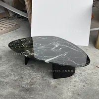 Table basse moderne en marbre noir fait main avec plateau réglable en hauteur, durable et design, pour salon