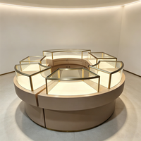 Ensemble de vitrines modulaires en îlot pour la vente en gros, présentoirs à montres éclairés par LED, armoires de rangement verrouillables, comptoirs circulaires pour bijoux