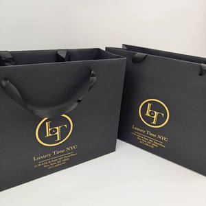 Sacs cadeaux de luxe en carton avec poignées longues, impression sérigraphique, logo personnalisé pour chaussures et vêtements, matériaux recyclés, vente en gros - Product Image 1