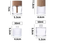Bouteille de parfum en verre ronde vide de 50ml avec bouchon en bois pour voiture pour diffuseur de roseaux ou parfums de voiture personnalisés