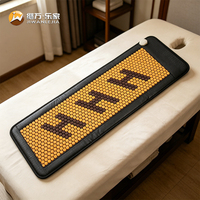 Tapis de massage chauffant en céramique de tourmaline hexagonale jaune personnalisé Jiwan Lejia pour salle de spa
