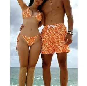 Low MOQ experienced factory custom men swimwear print high rise couple matching his and her swim wear