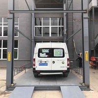 Système d'ascenseur hydraulique à quatre poteaux sur mesure pour le transport de véhicules entre le sous-sol et les étages supérieurs