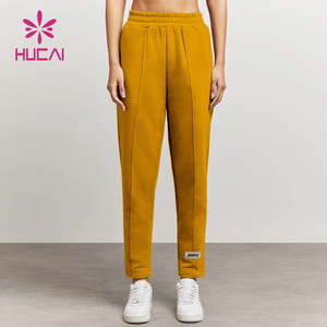 HUCAI OEM ODM Nylon Spandex Alto soporte Color liso Etiqueta personalizada Slim Fit Entrenamiento Fitness Pantalones de chándal para mujeres - Product Image 5