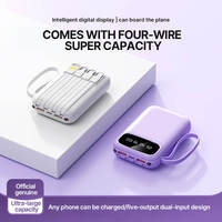 Batterie externe portable haute capacité 10000mAh avec câble 4-en-1 intégré pour téléphone portable