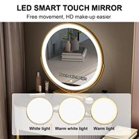 Coiffeuse compacte 50/60/70 cm avec bord cannelé, armoire latérale interchangeable et miroir LED rond.