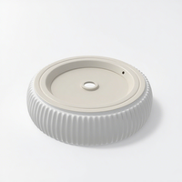 Lavabo rond en céramique moderne sous le comptoir pour lavabo à main dans la salle de bain des toilettes de l'hôpital